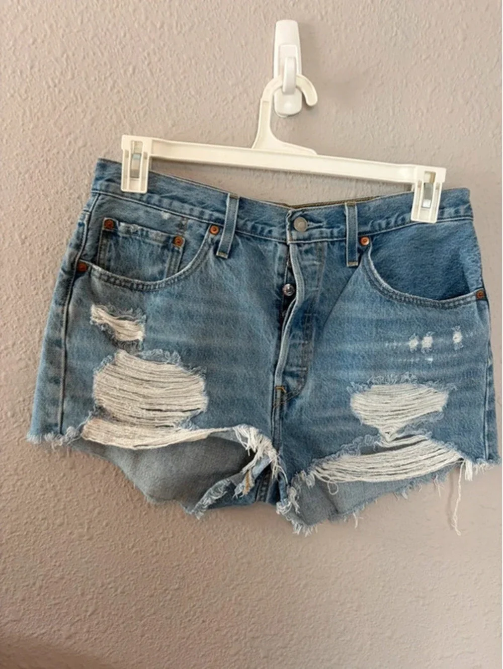Levi's 501 light wash shorts size W31. 2.5in inseam. Spot on front